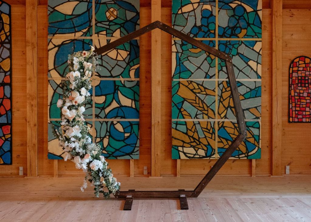 Floral wedding arch prepared for an intimate ceremony at a unique wedding venue in Denmark.